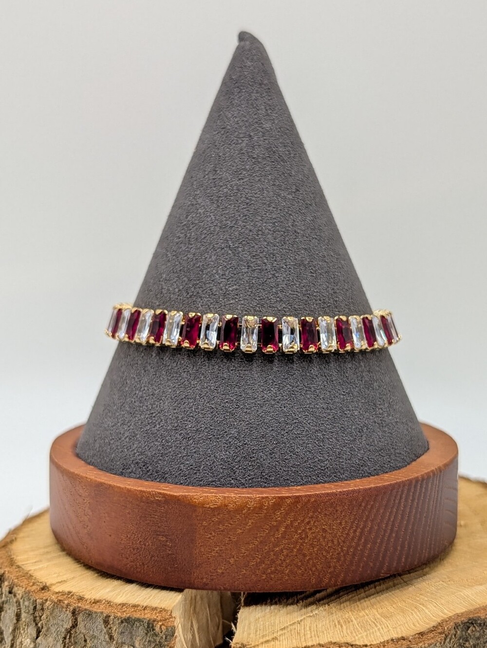 Gold tone Bar Link Bracelet with Red And White Baguette Gems